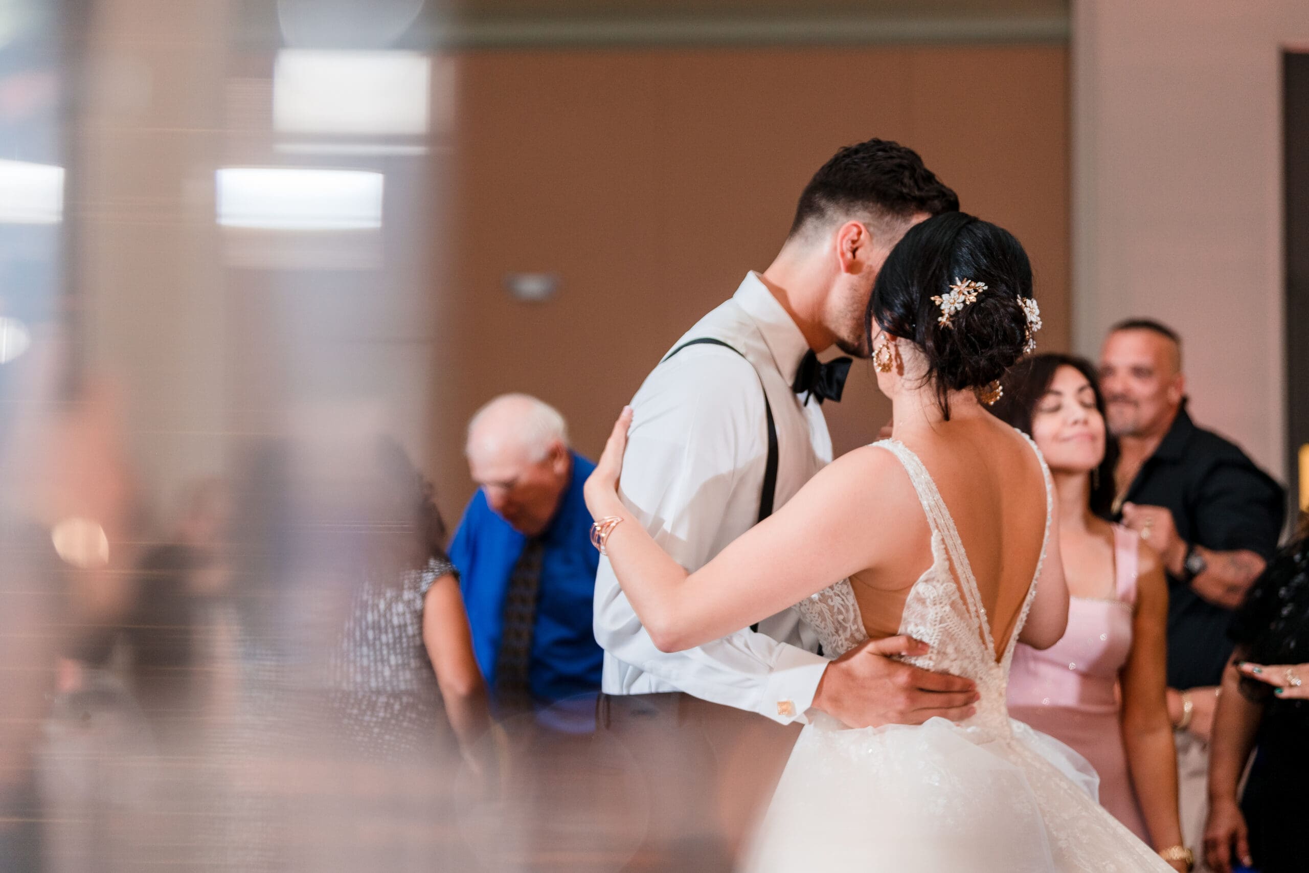 Close-up shot of Jessica and Javier during their first dance at the Orlando Royale Caribe reception center, beautifully photographed by Jerzy Nieves Photography.