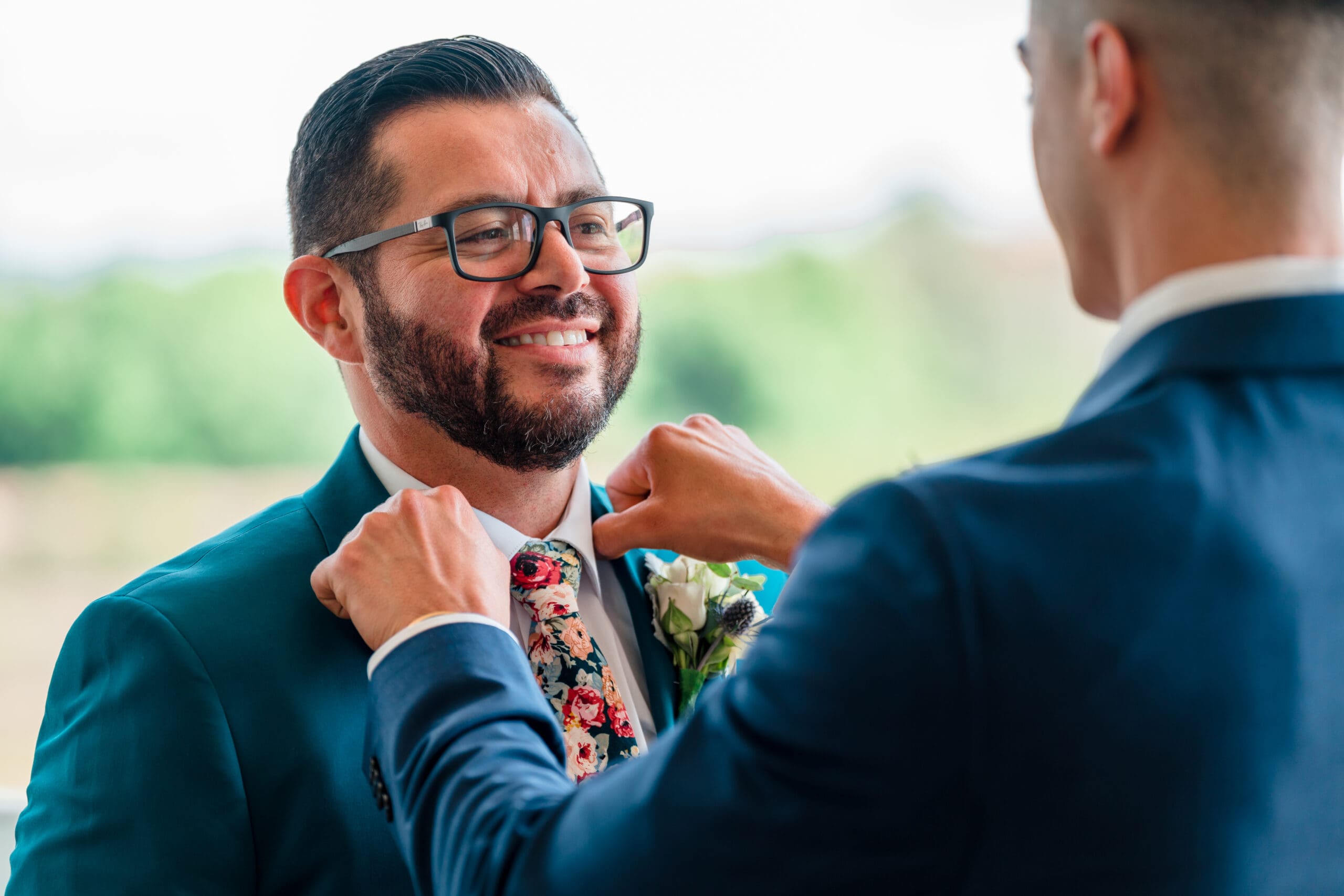 Best Man Adjusting Carlos's Collar Before the Wedding