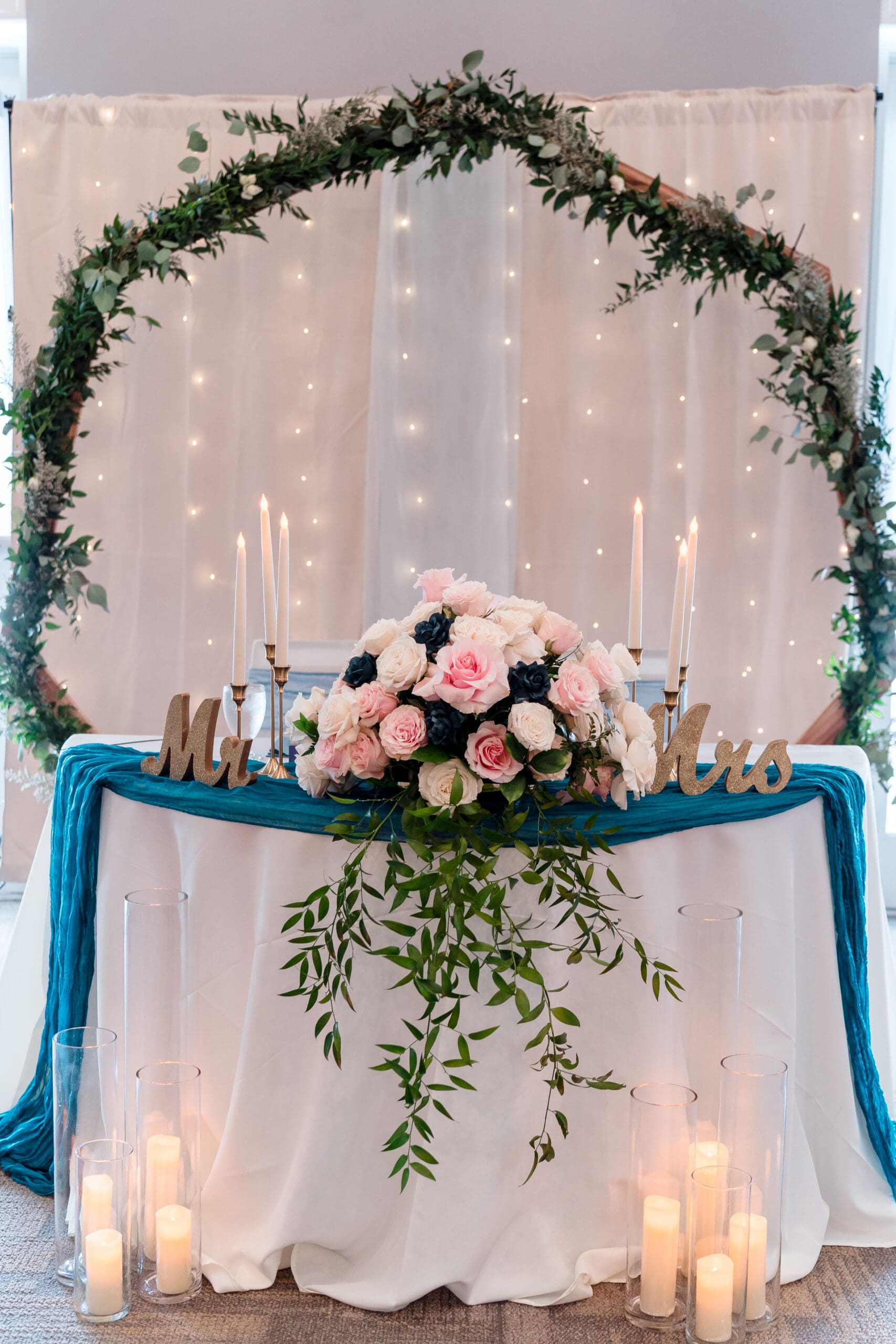 Decorated Mr. and Mrs. Table with Flowers and Candles at Island Grove Recreation Center
