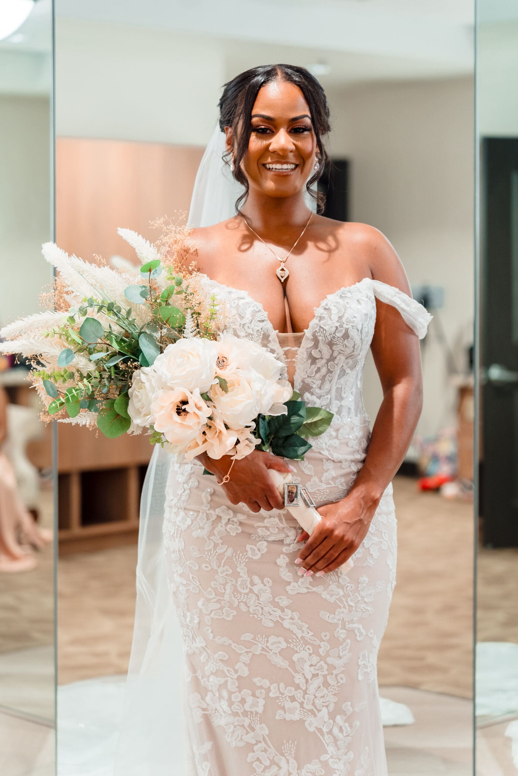 Radiant bride sharing a heartwarming moment filled with laughter and smiles alongside her beautiful bridesmaids, creating unforgettable memories at All Inclusive Weddings Orlando