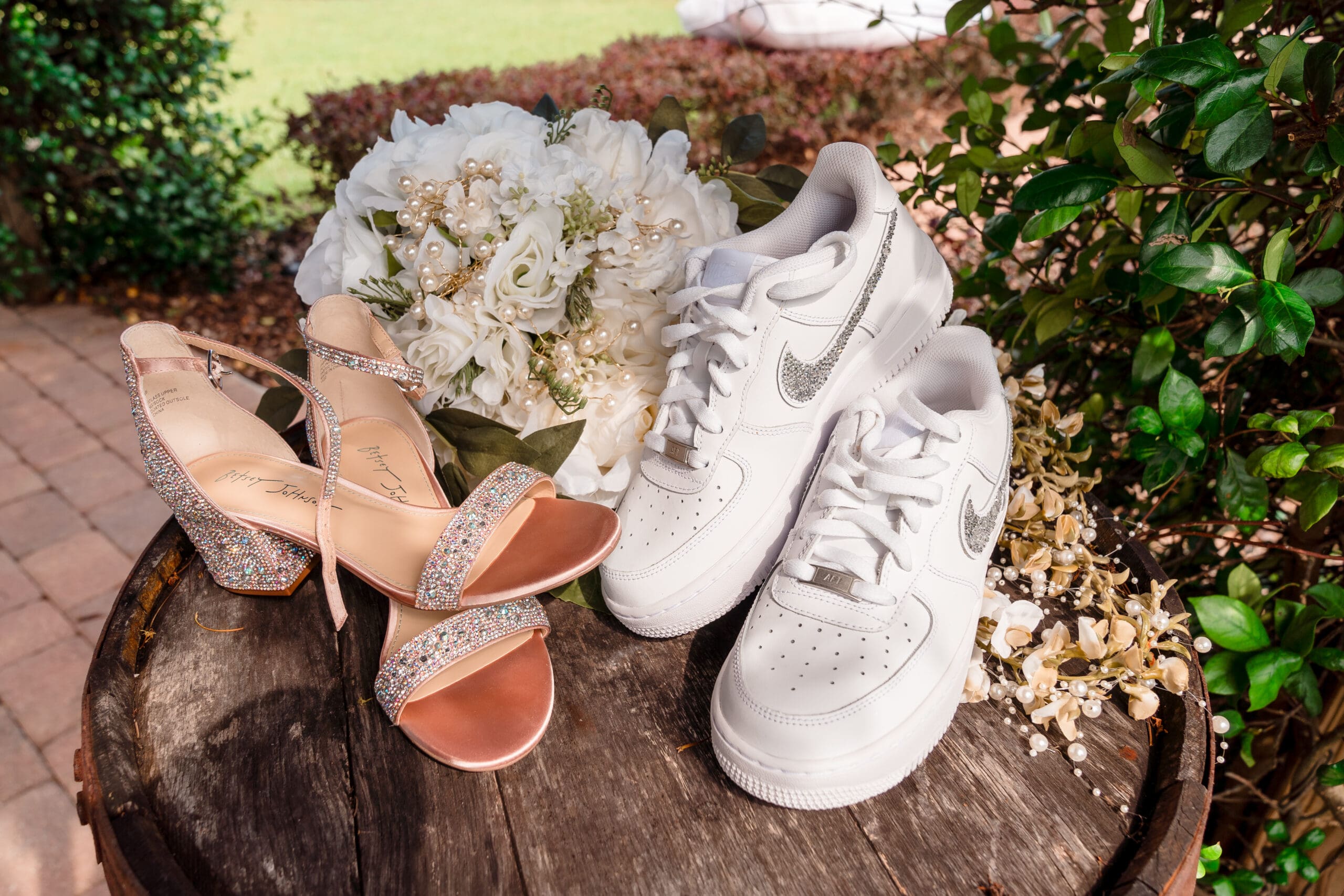Taylor and David's Shoes and Bouquet on Barrel