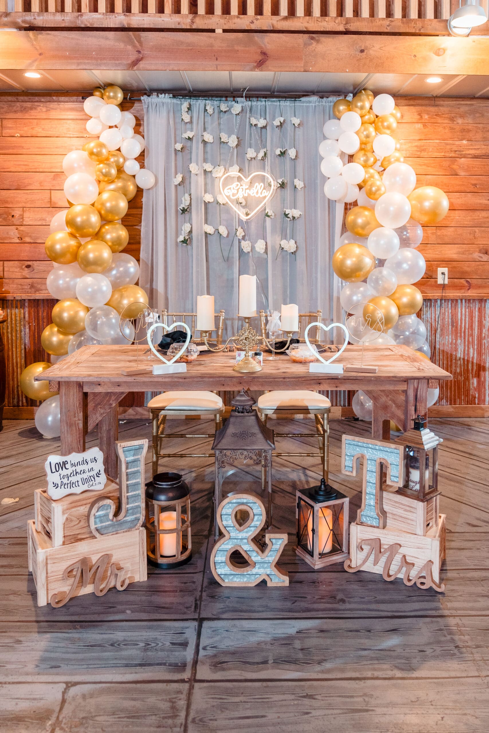 Close-up of the bride and groom's table at Taylor and David's Hidden Barn wedding
