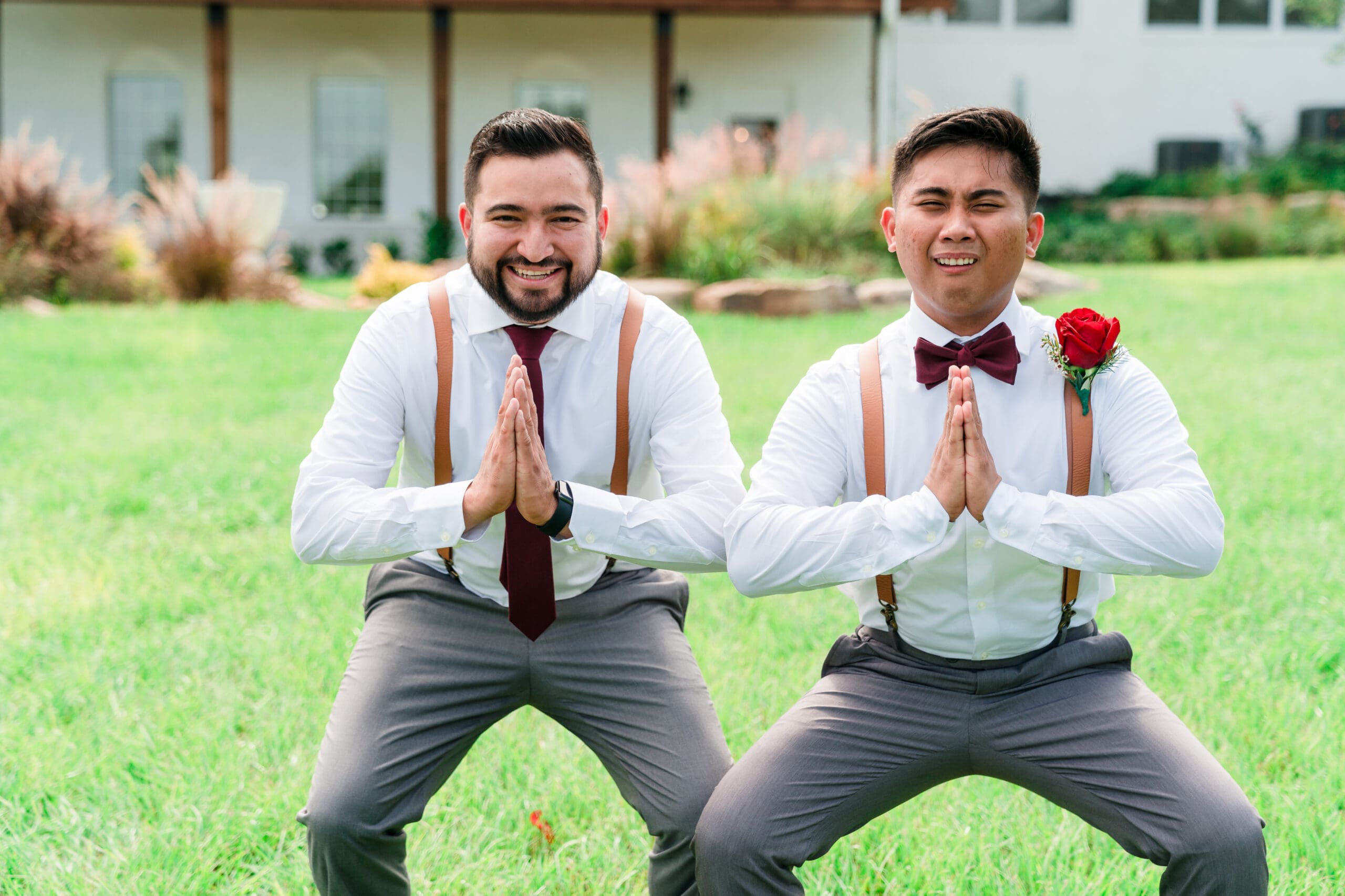 Jonah and his groomsmen in a squatting position with prayer hands, showcasing their fun personalities at Sterling Event Venue Garden