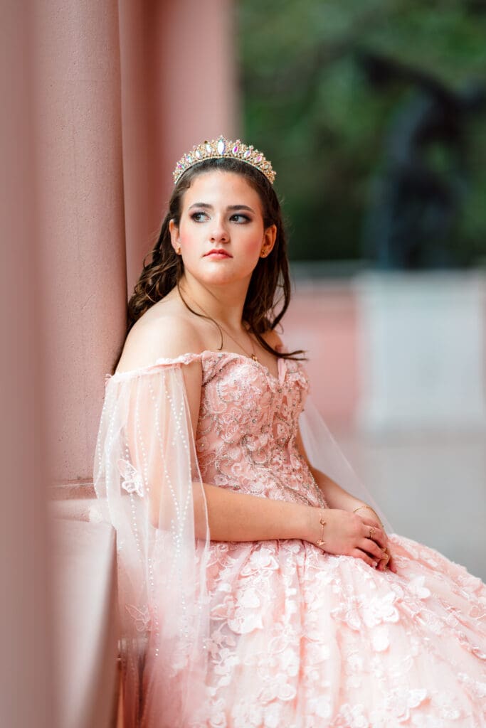 Quinceañera photo with a sparkling tiara and a joyful smile