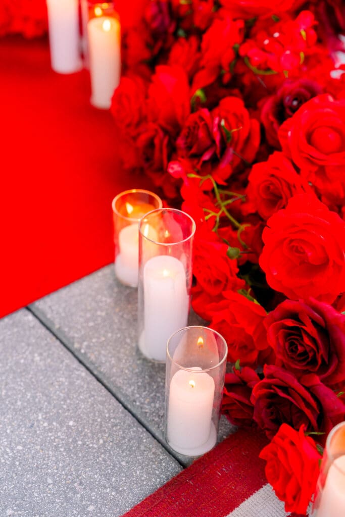 Emotional surprise proposal in Downtown Orlando at Eola View with city skyline